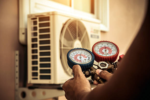 Professional Ductwork Repair technician working in Magnolia Springs, AL